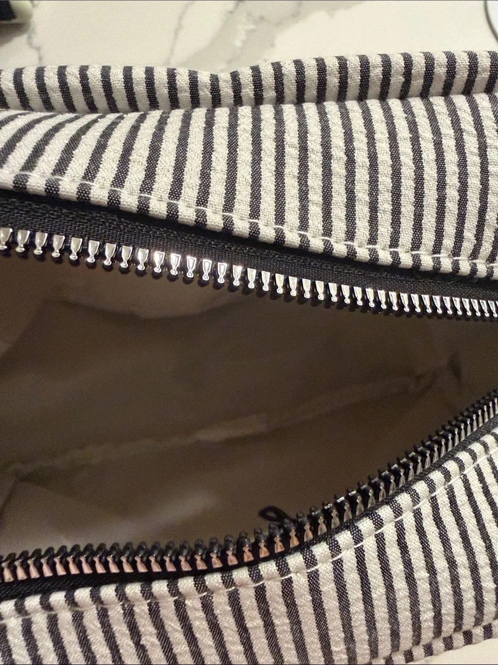 Striped Black and White Makeup Bag with Script Detail